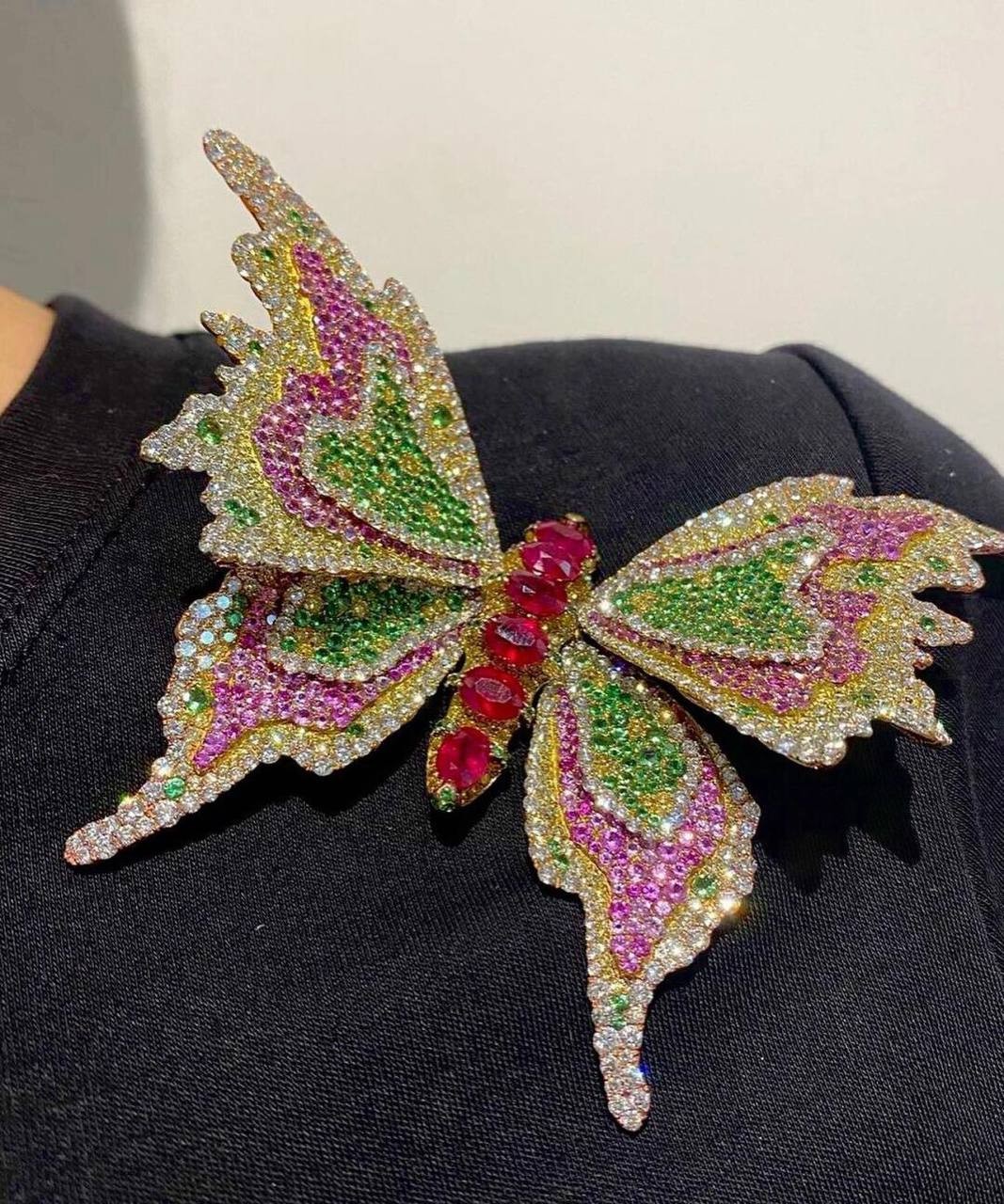 Titanium and gold inlaid with colored gemstones butterfly brooch. Height 4.3cm Width: 7.9cm